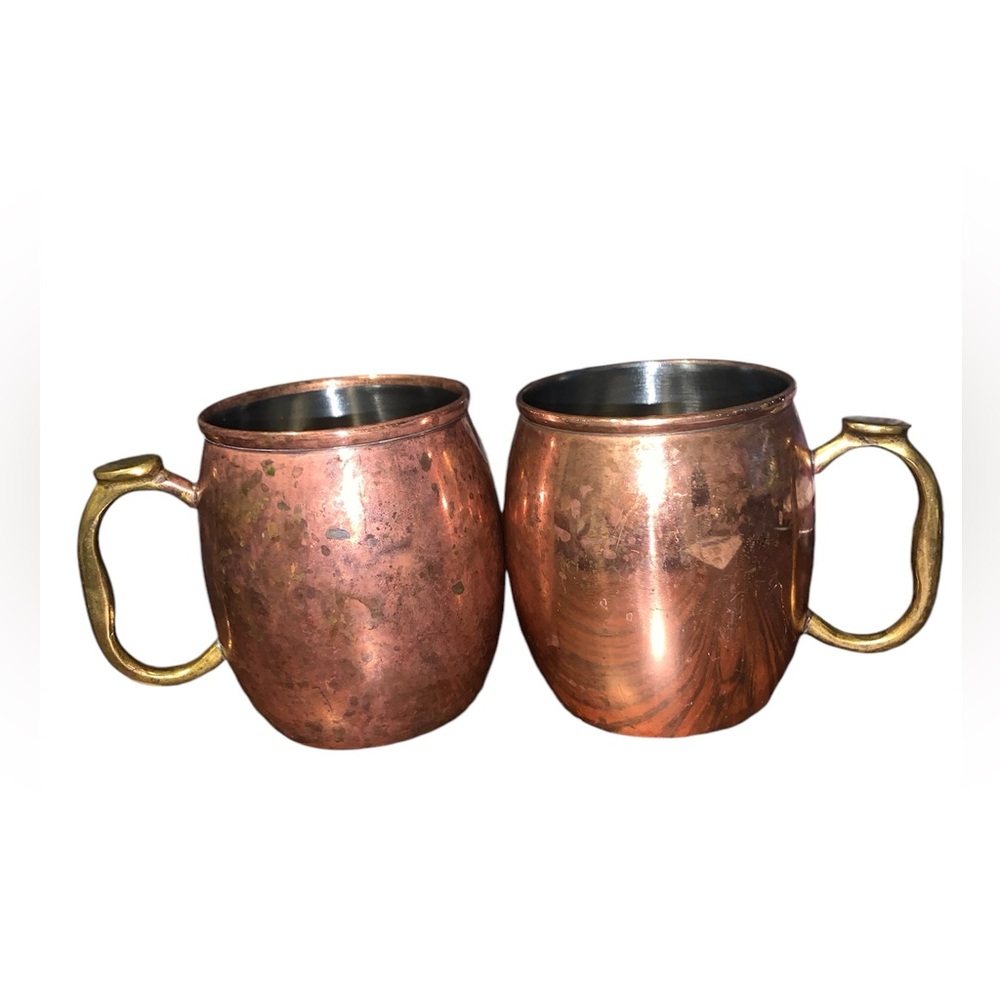 Pair of OGGI Copper mugs with Stainless steel inside and Brass handles.